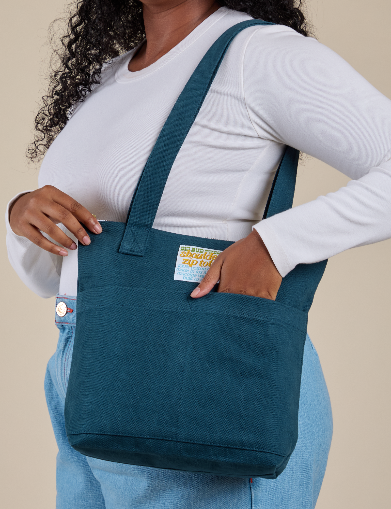 Over-Shoulder Zip Mini Tote in Lagoon worn on shoulder of model