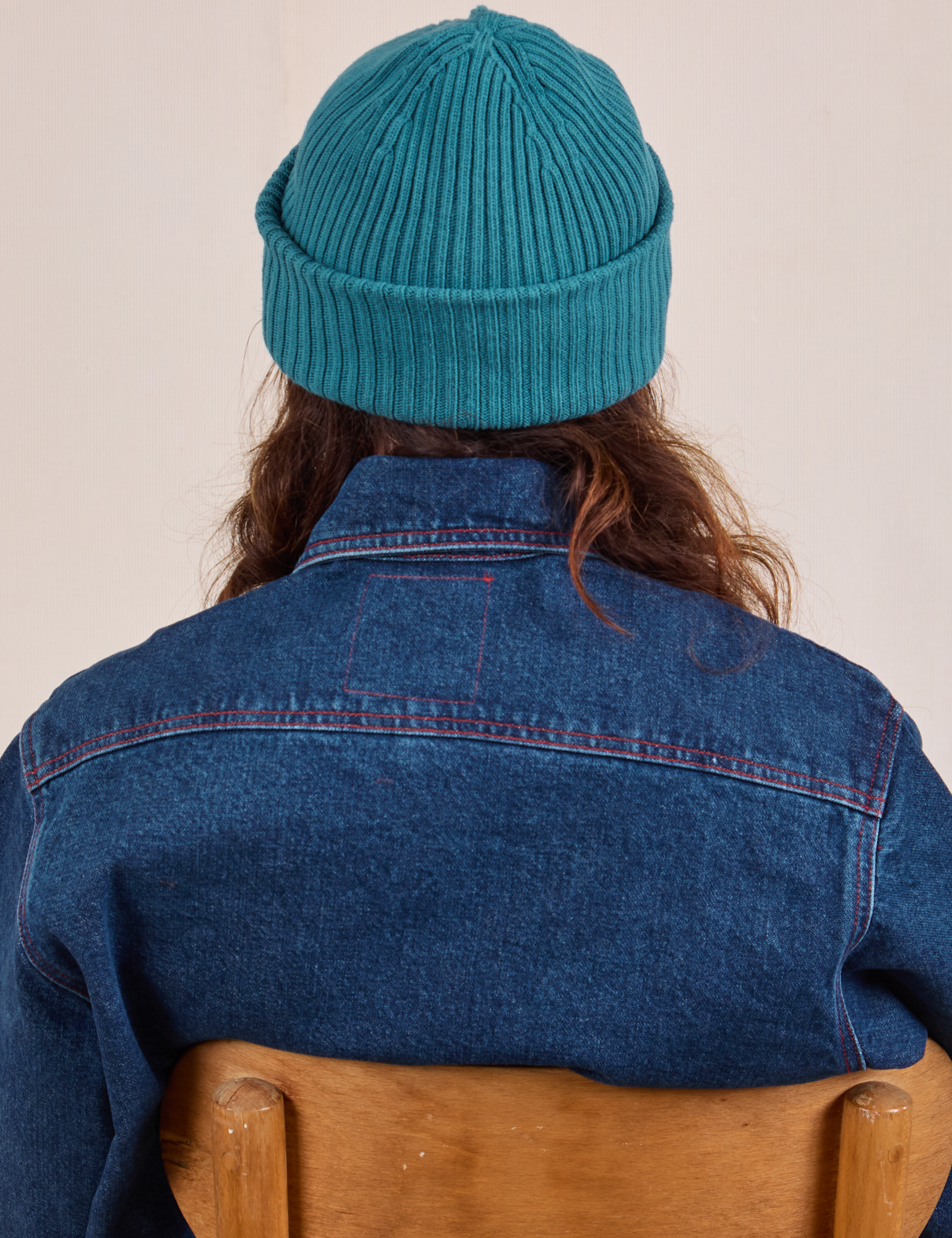 Ribbed Beanie in Marine Blue back view worn by Alex