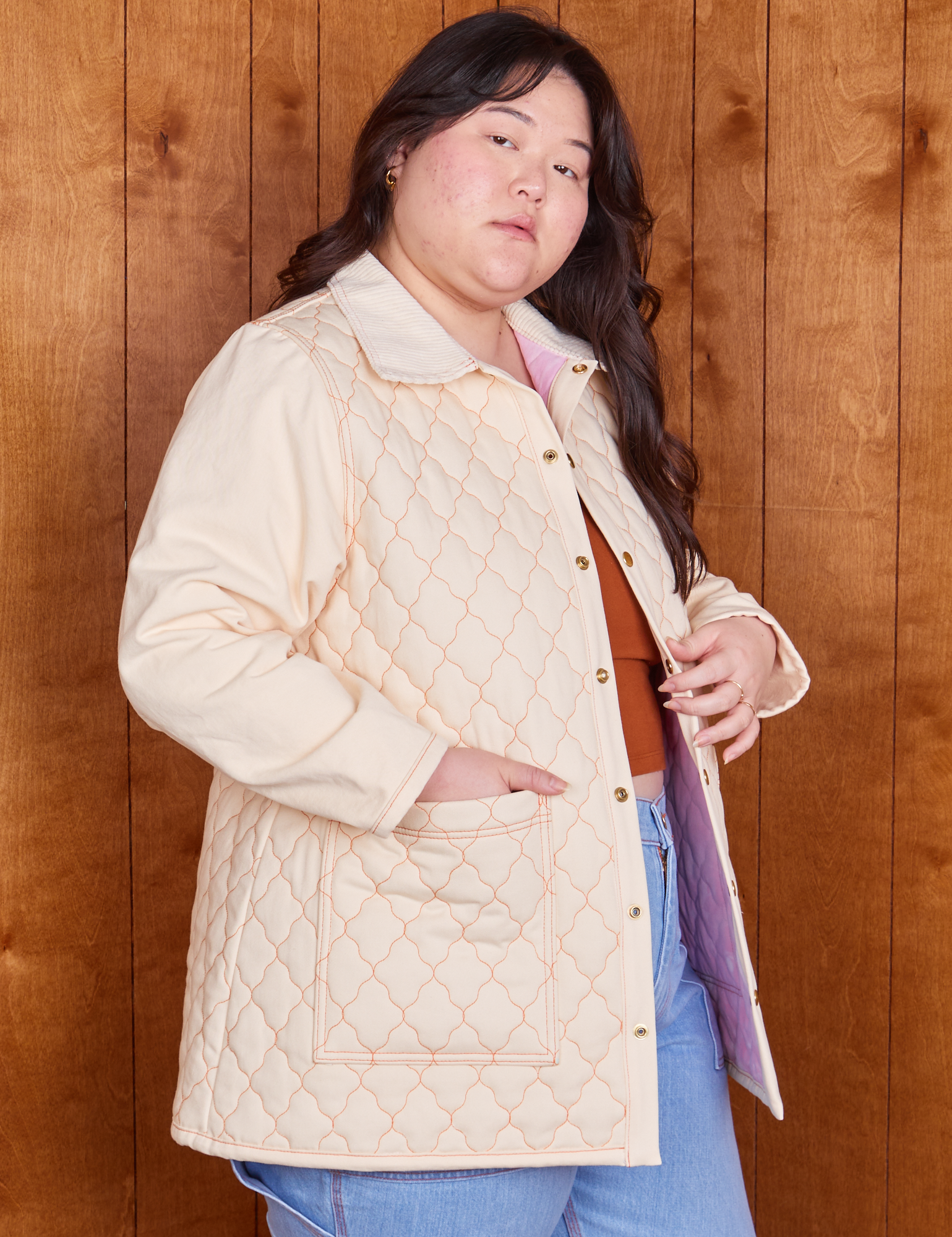 Side view of Quilted Overcoat in Vintage Off-White on Ashley