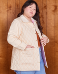 Side view of Quilted Overcoat in Vintage Off-White on Ashley