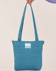 Over-Shoulder Zip Mini Tote in Marine Blue held by model