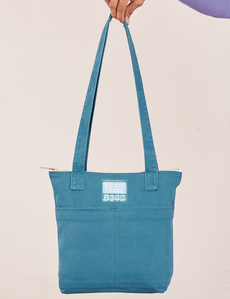 Over-Shoulder Zip Mini Tote in Marine Blue held by model