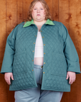 Catie is 5'11" and wearing 5XL Quilted Overcoat in Marine Blue