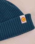 Ribbed Beanie in Lagoon close up of sun baby tag