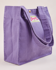 Angled view of Shopper Tote Bag in Faded Grape