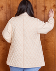 Back view of Quilted Overcoat in Vintage Off-White on Ashley