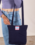 Over-Shoulder Zip Mini Tote in Navy worn on model's arm