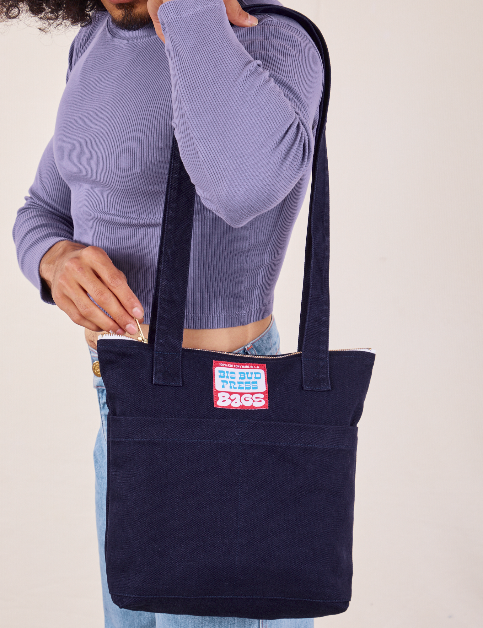 Over-Shoulder Zip Mini Tote in Navy worn on shoulder