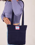 Over-Shoulder Zip Mini Tote in Navy worn on shoulder