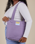 Over-Shoulder Zip Mini Tote in Faded Grape worn on shoulder of model