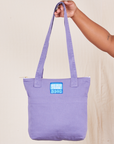 Over-Shoulder Zip Mini Tote in Faded Grape held by model