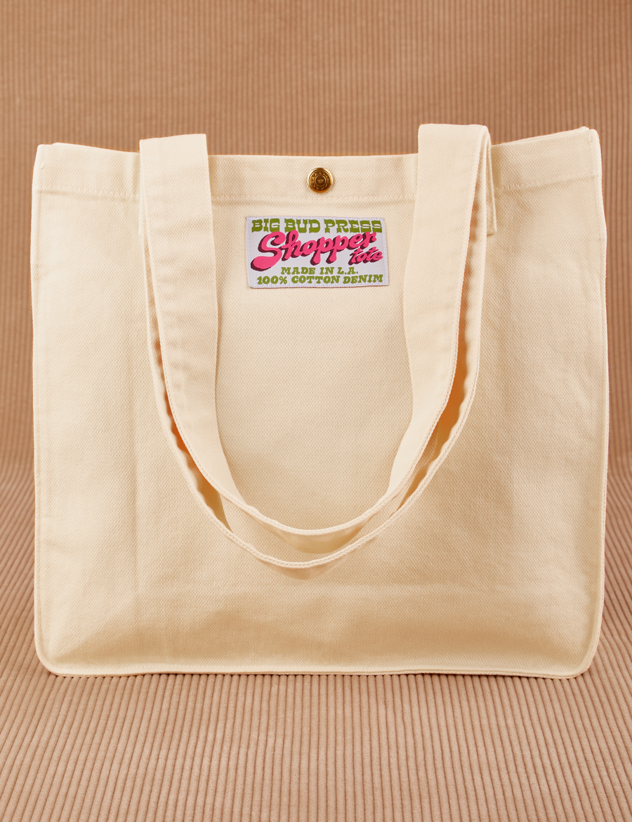 Shopper Tote Bag in vintage off-white with straps hanging down front of bag