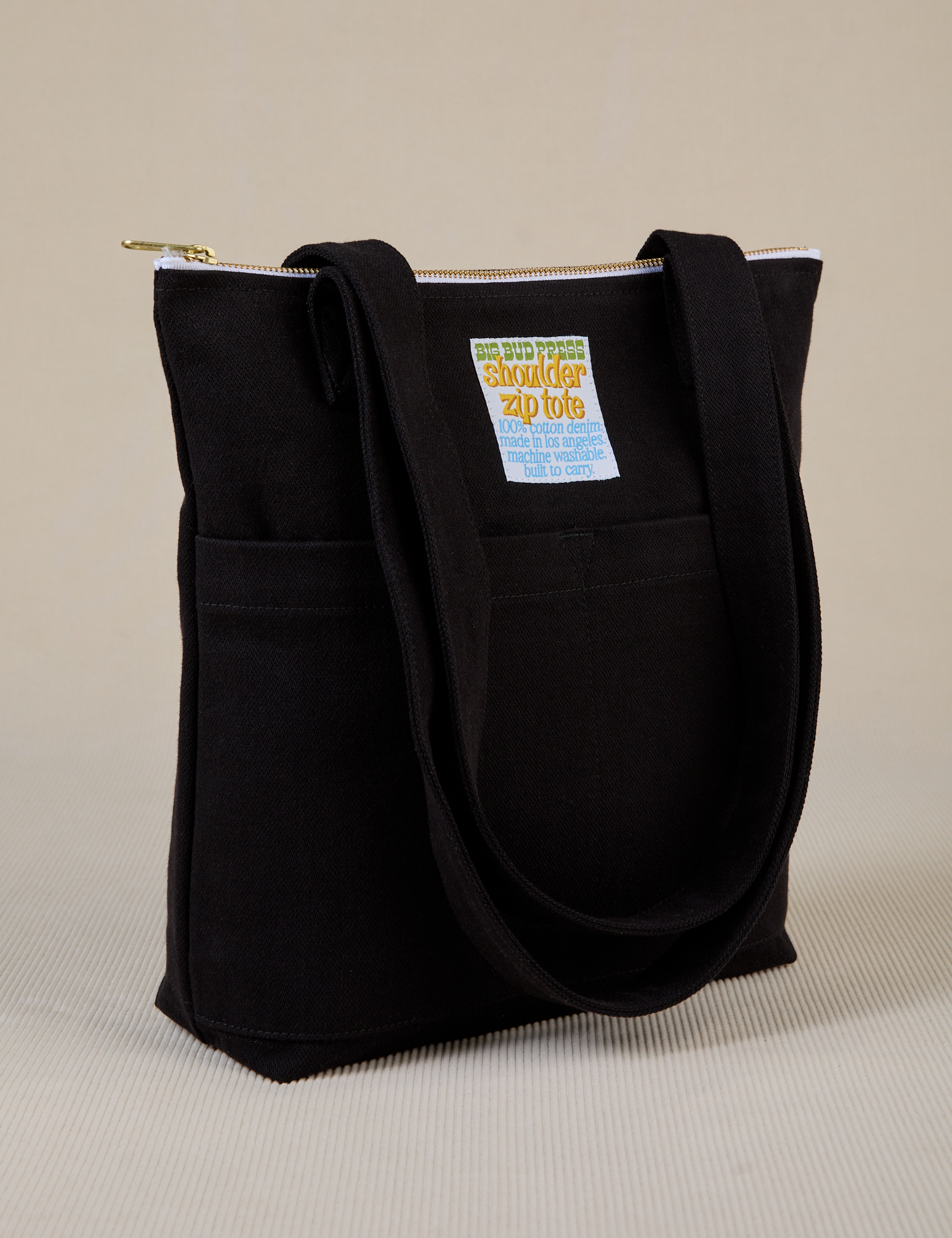 Angled view of Over-Shoulder Zip Mini Tote in Basic Black