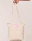 Over-Shoulder Zip Mini Tote in Vintage Off-White held by model