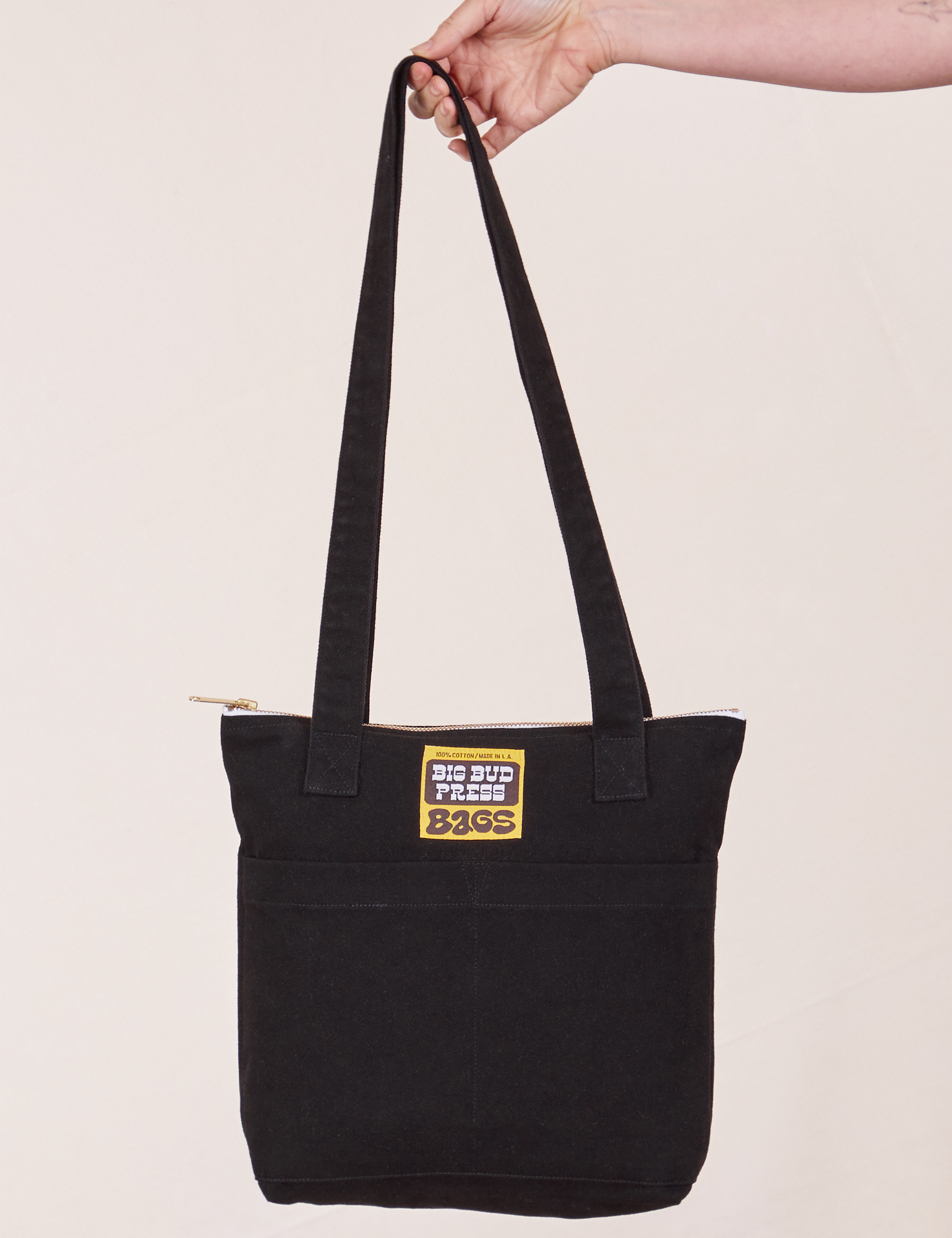 Over-Shoulder Zip Mini Tote in Black held by model