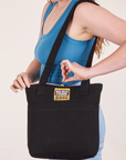 Over-Shoulder Zip Mini Tote in Black worn on shoulder