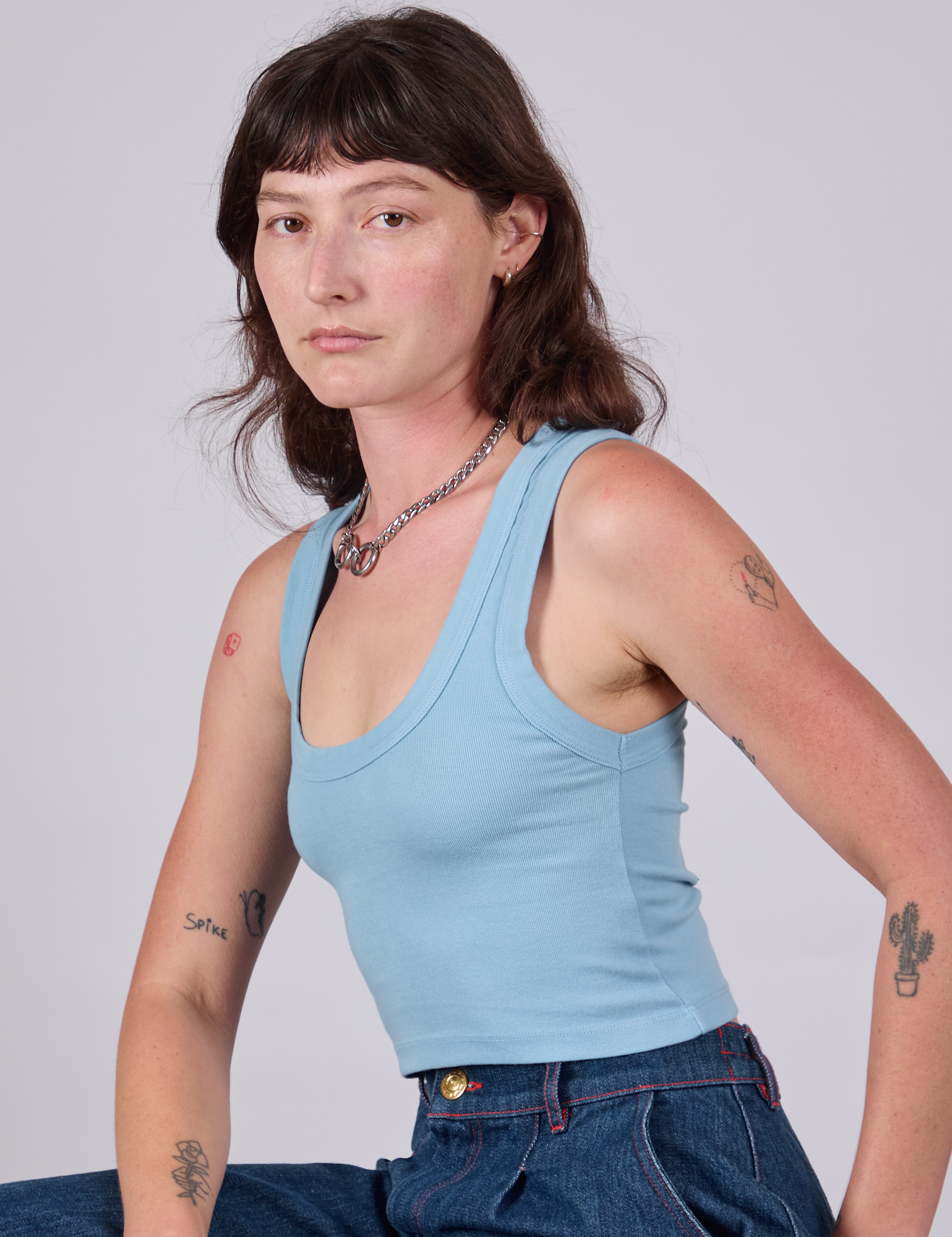 Cropped Tank Top in Baby Blue side view on Alex