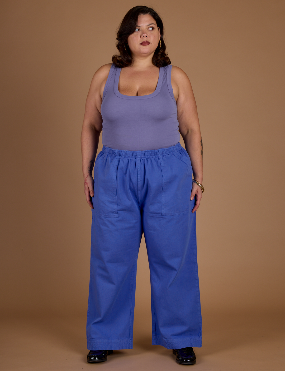 Kristen wearing the Cornflower Blue Action Pant with the Faded Grape Cropped Tank
