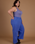 Side view of Kristen in the Cornflower Blue Action Pant