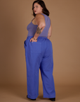 Angled back view of the Cornflower Blue Action Pant