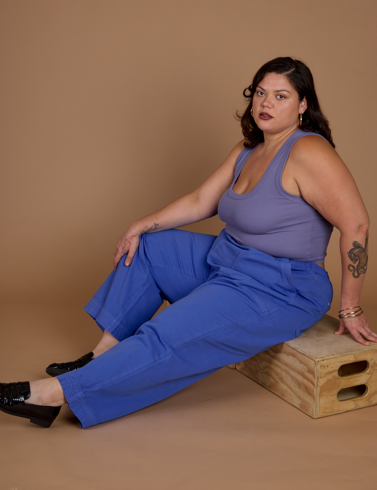 Kristen wearing the Cornflower Blue Action Pant with the Faded Grape Cropped Tank