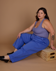 Kristen wearing the Cornflower Blue Action Pant with the Faded Grape Cropped Tank