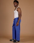 Side view of the Cornflower Blue Action Pant on Isaac