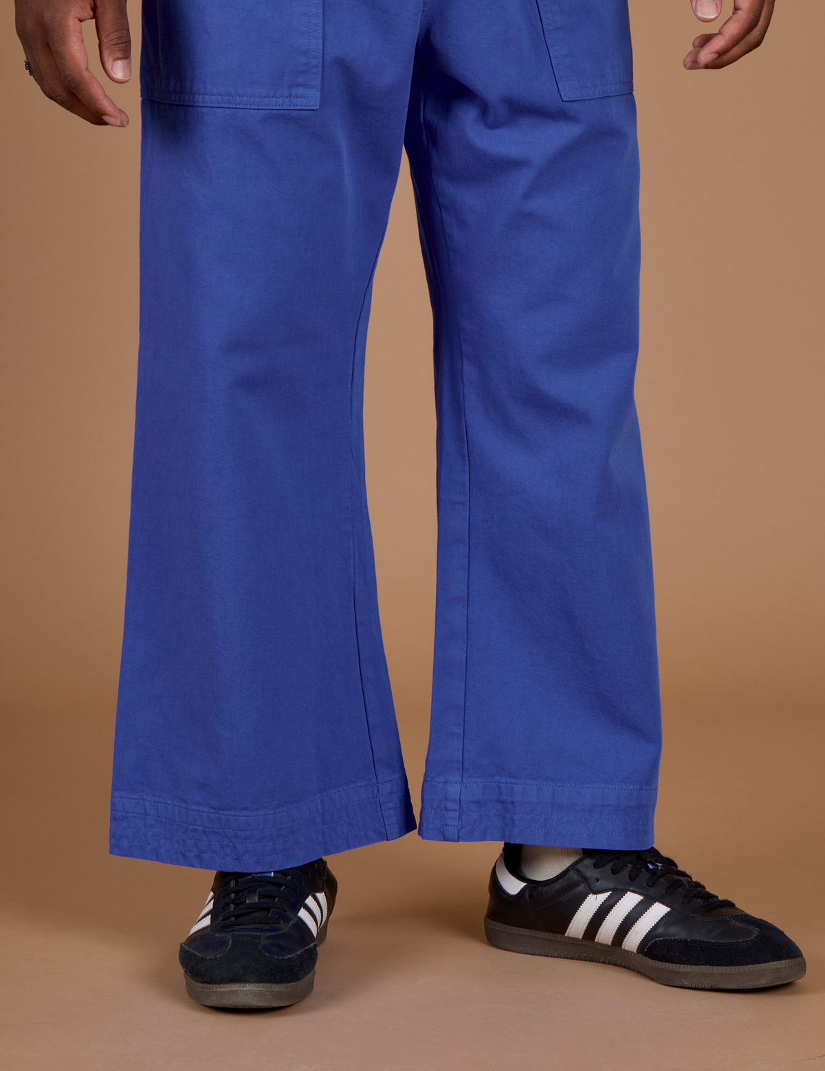 Close up of the Cornflower Blue Action Pant on Isaac