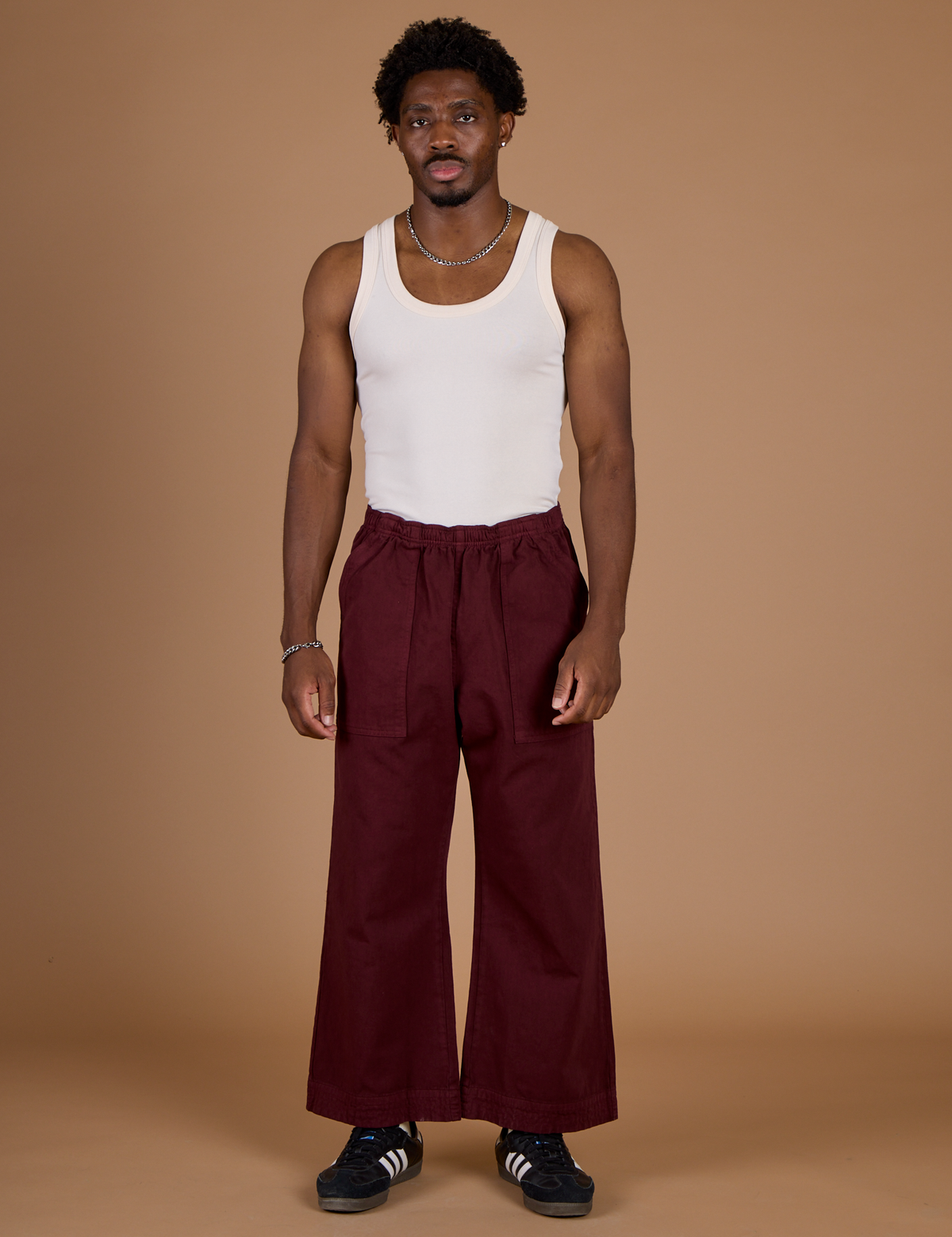 Isaac is 5'10" and wearing M Red Wine Action Pant