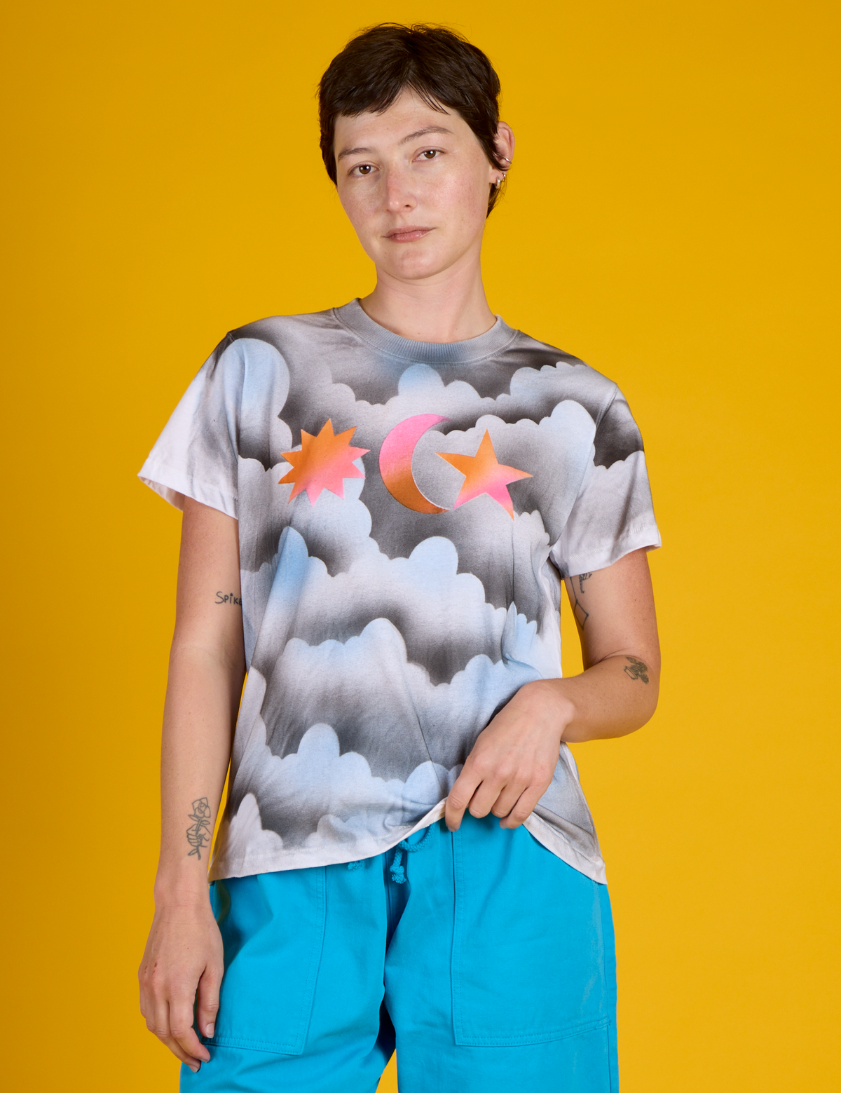 Alex is 5'8 and wearing P Dark Cloud & Sky Airbrush Vintage Tee