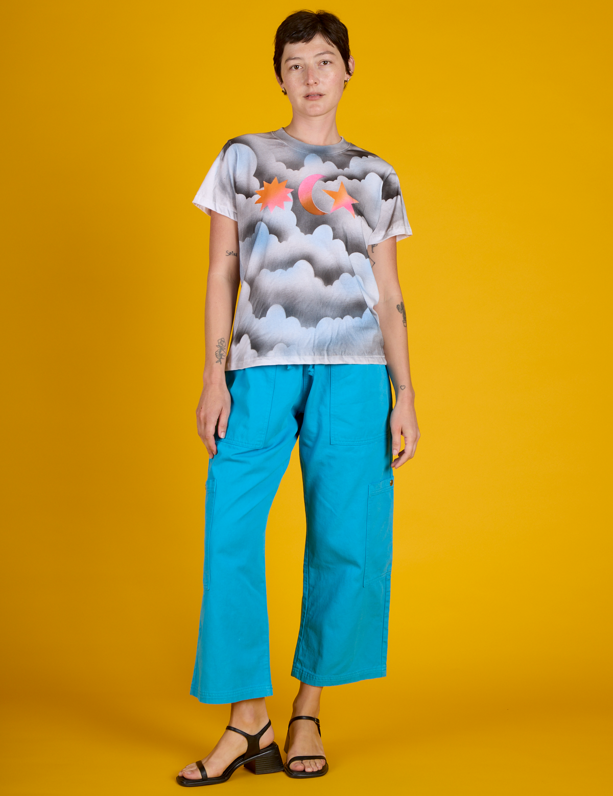 Alex wearing the Dark Cloud &amp; Sky Airbrush Vintage Tee with Hawaiian Blue Drop Pocket Cargo Pants