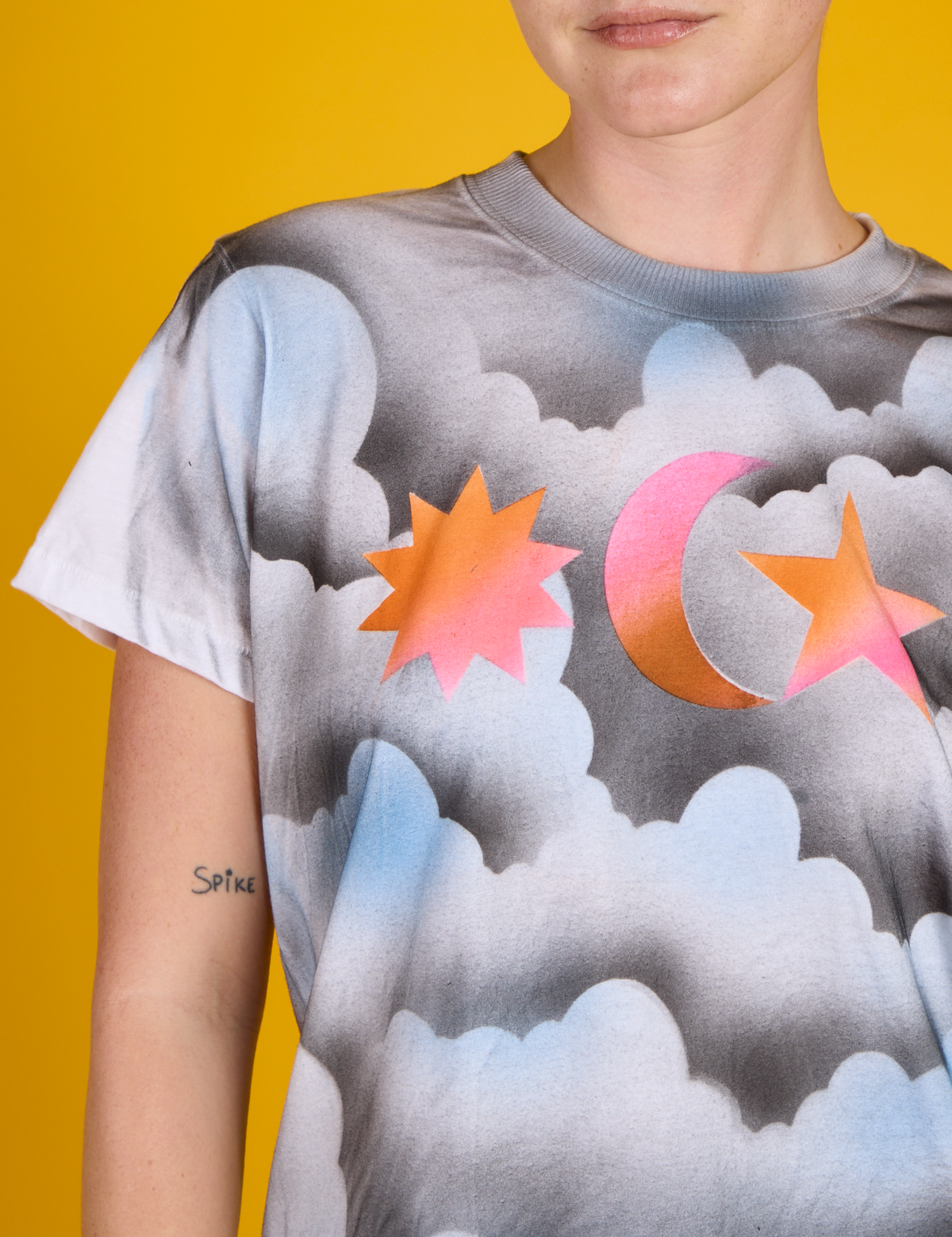 Front close up of the the Dark Cloud &amp; Sky Airbrush Vintage Tee on Alex