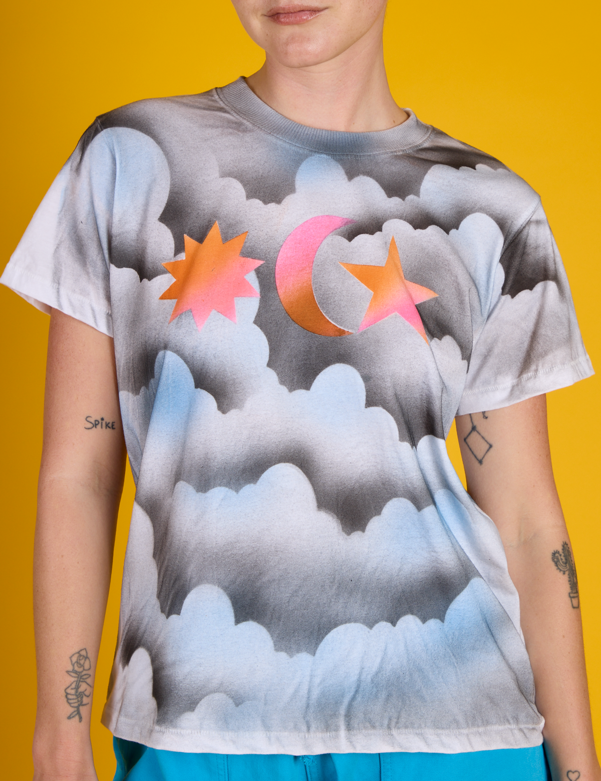 Front close up of the Dark Cloud &amp; Sky Airbrush Vintage Tee on Alex