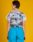 Back view of the Dark Cloud & Sky Airbrush Vintage Tee on Alex