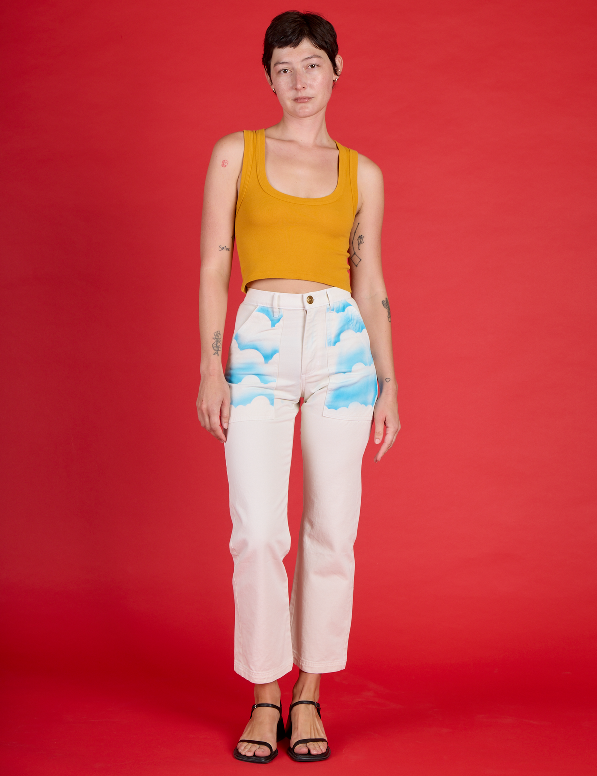 Alex is 5'8" and wearing XXS Pockets of Sky Airbrush Work Pants