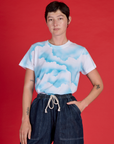 Alex is wearing the Cloud Coverage Airbrush Vintage Tee tucked in