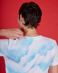 Close up back view of Alex wearing the Cloud Coverage Airbrush Vintage Tee