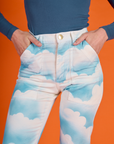 Close up of Alex's hand in the front pockets of the Cloud Coverage Airbrush Work Pants