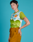 Side view of Alex wearing the Green Hills Airbrush Vintage Tee