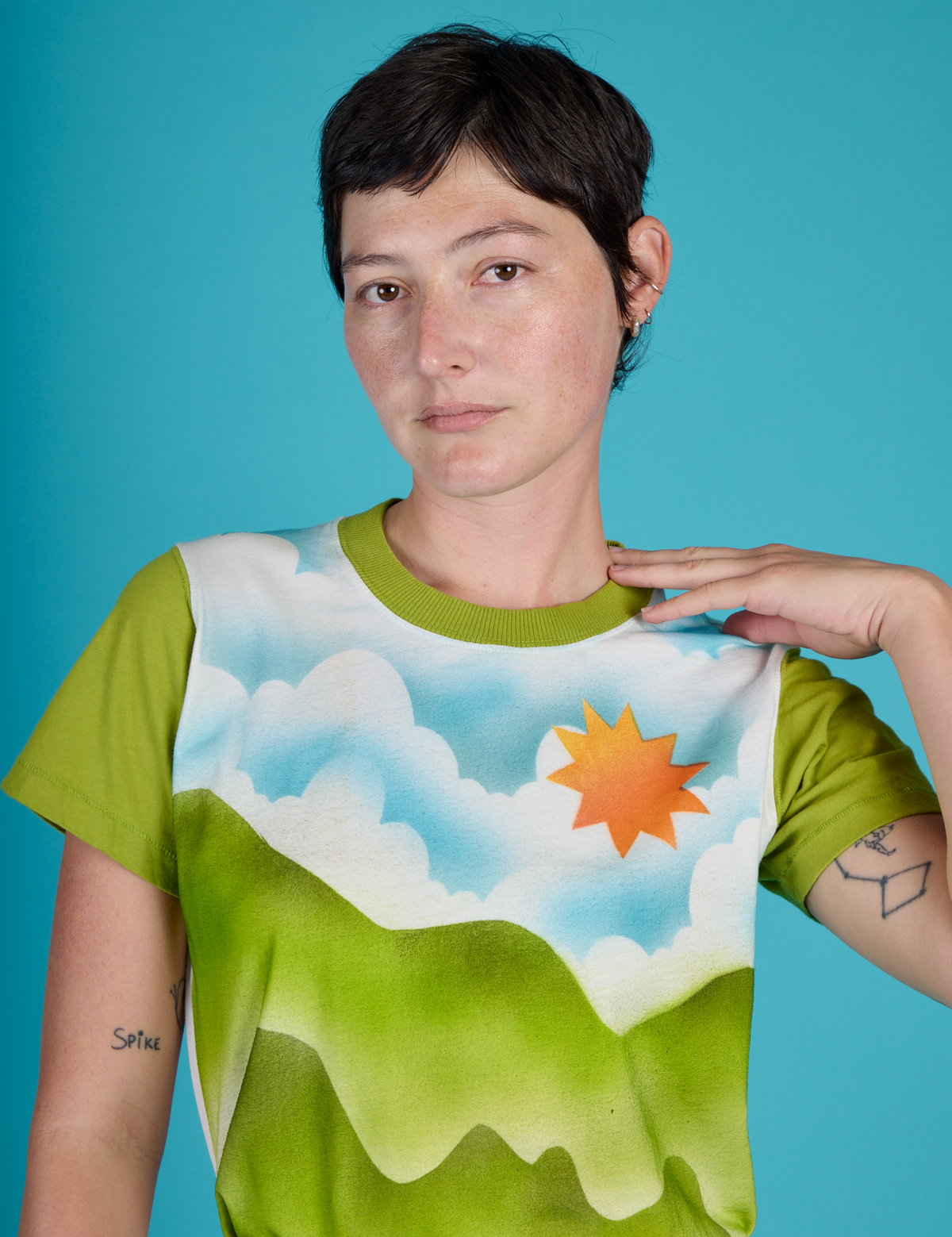 Close up of Alex wearing the Green Hills Airbrush Vintage Tee