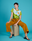 Alex wearing the Green Hills Airbrush Vintage Tee with Spicy Mustard Drop Pocket Pants