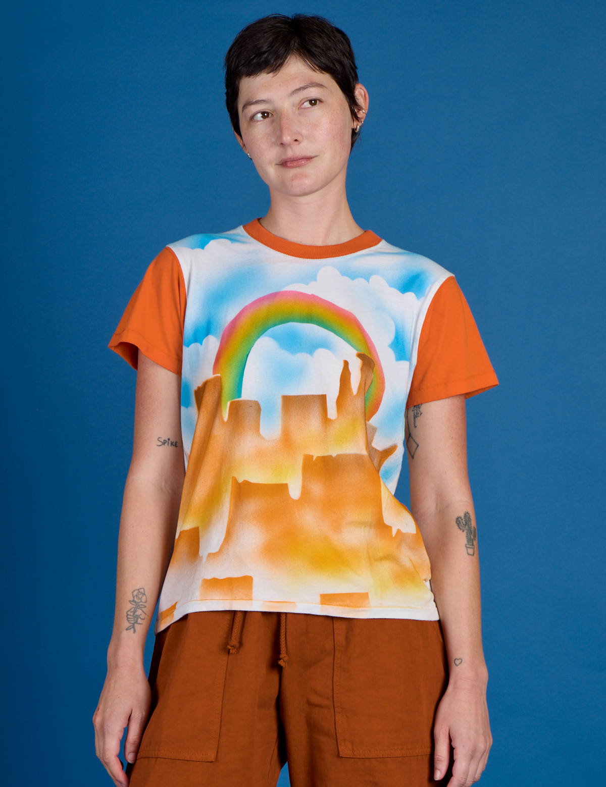 Alex is 5'8 and Wearing P Orange Mesa Airbrush Vintage Tee