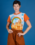 Alex wearing the Orange Mesa Airbrush Vintage Tee tucked in