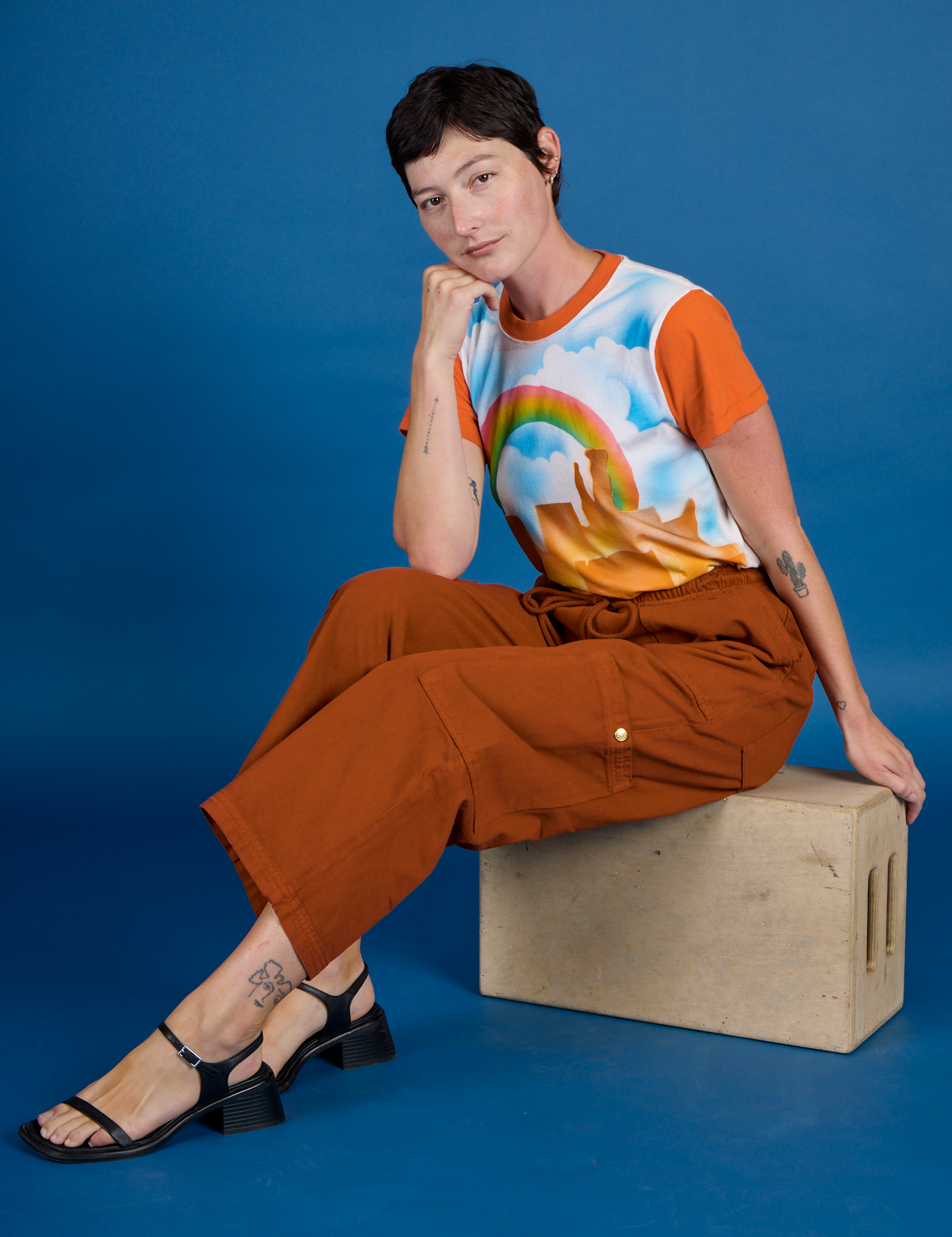 Alex in the the Orange Mesa Airbrush Vintage Tee with the Burnt Terracotta Drop Pocket Pants
