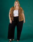 Juliet is 5'7" and wearing L Leopard Pantry Button Up with the Black Drop Pocket Pants