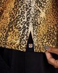 Close up of the side vent of the Leopard Pantry Button Up on Kira