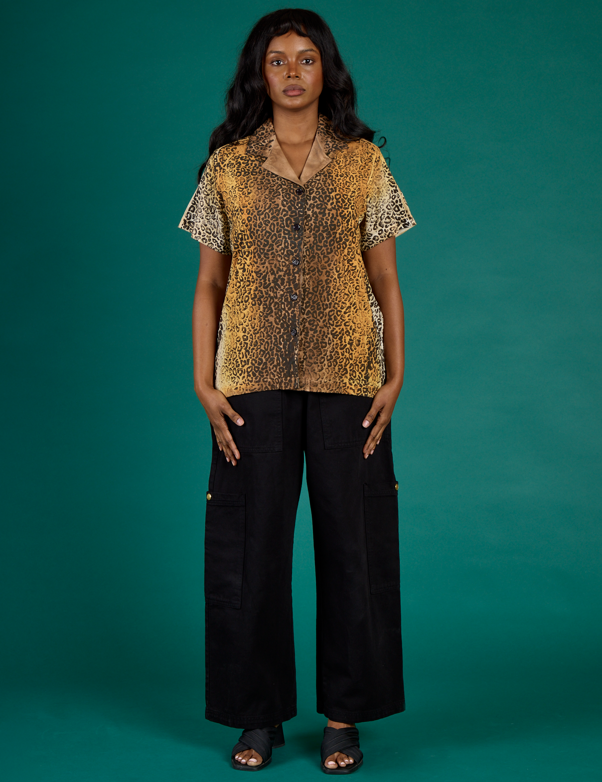 Kandia wearing the Leopard Pantry Button Up with the Black Drop Pocket Cargo Pant
