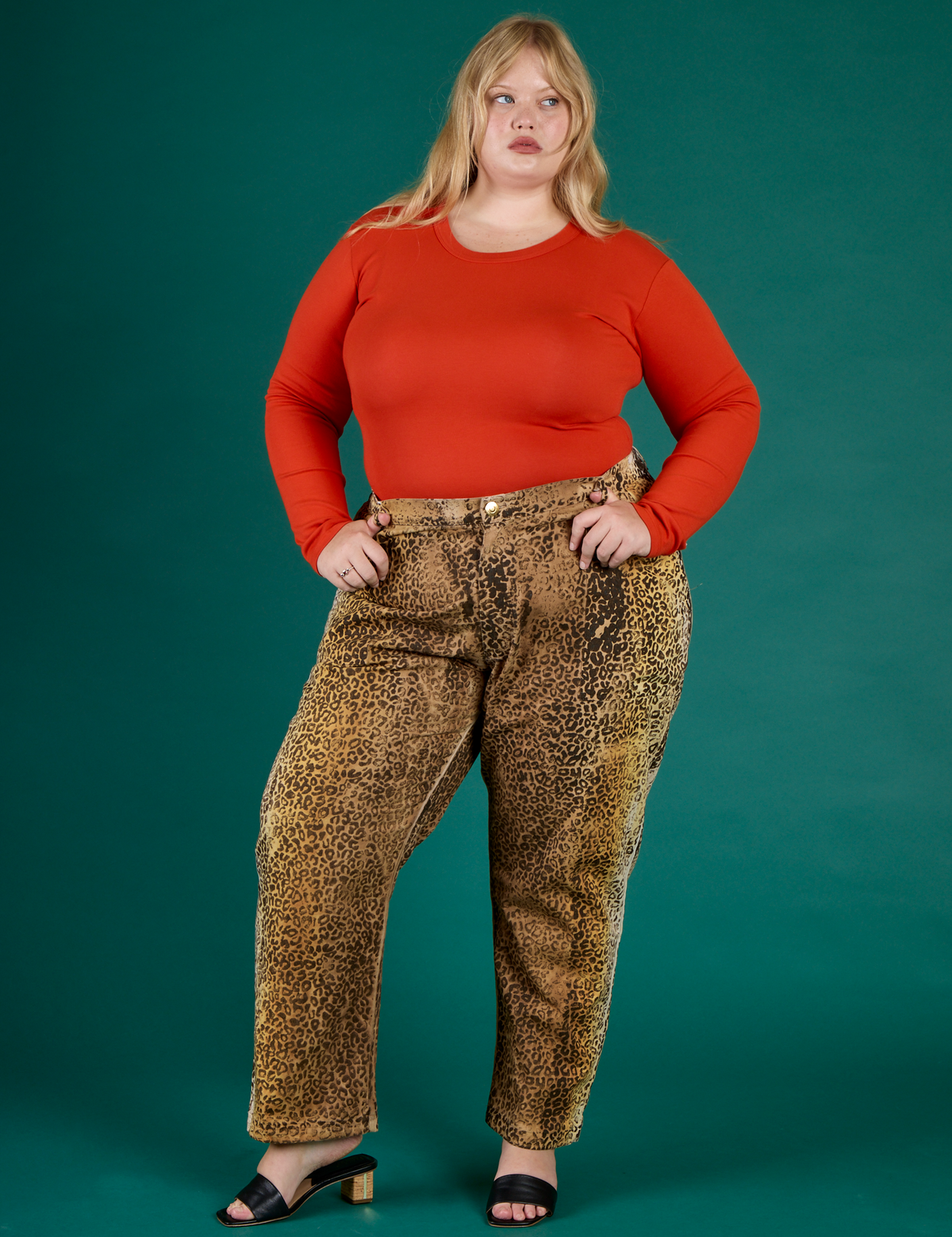 Juliet is 5’7” and wearing 2XL Leopard Work Pant with the Chili Red Long Sleeve Baby Tee