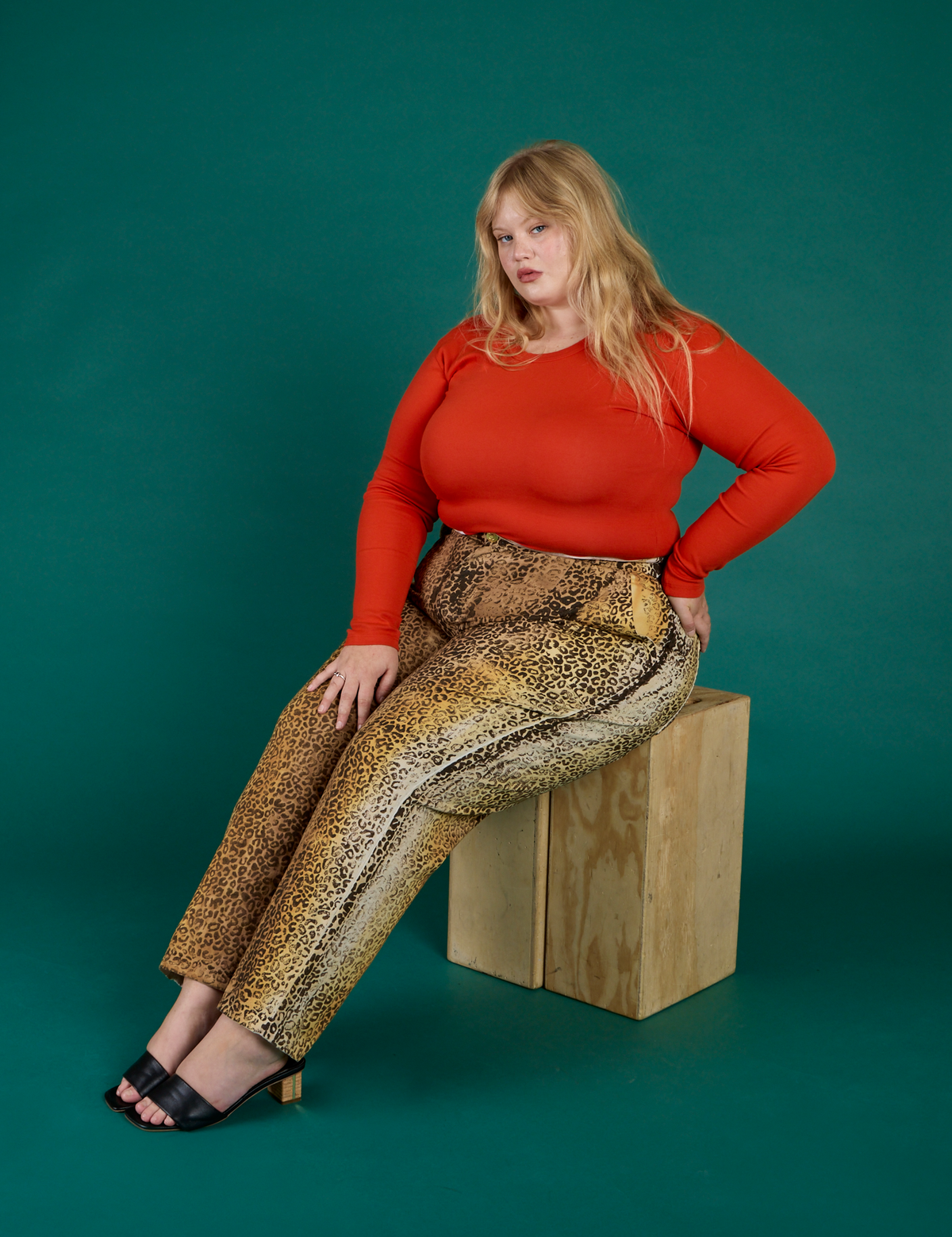 Juliet wearing the Leopard Work Pant with Chili Red Long Sleeve Baby Tee