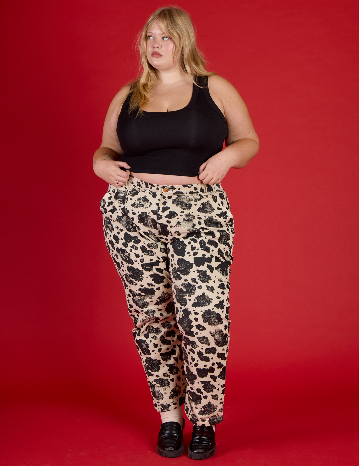Juliet wearing the Cow Work Pant with the Black Cropped Tank